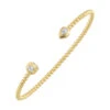 This Delicate Yellow Gold Bangle, Culminating In An Emerald And Pear-shaped Diamond, Exudes Contemporary Femininity. The Beaded Details Enhance Its Allure, Creating A Timeless Piece Of Art. 2 This Delicate Yellow Gold Bangle, Culminating In An Emerald And Pear-shaped Diamond, Exudes Contemporary Femininity. The Beaded Details Enhance Its Allure, Creating A Timeless Piece Of Art. -DIAMOND JEWELRY SHOP BG10052 4YC