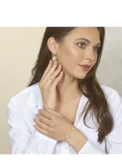 14K Yellow Gold Quatrefoil Diamond Fashion Reversible Pendant (0.20CTW) 7 14K Yellow Gold Quatrefoil Diamond Fashion Reversible Pendant (0.20CTW) -DIAMOND JEWELRY SHOP ER10620 4YCSC NK10243 4YC RG11677 4YC BG10048 4YC UpscaleModel 2023202372981 3913fcbb 6909 450c b27a 0520aeb8e334